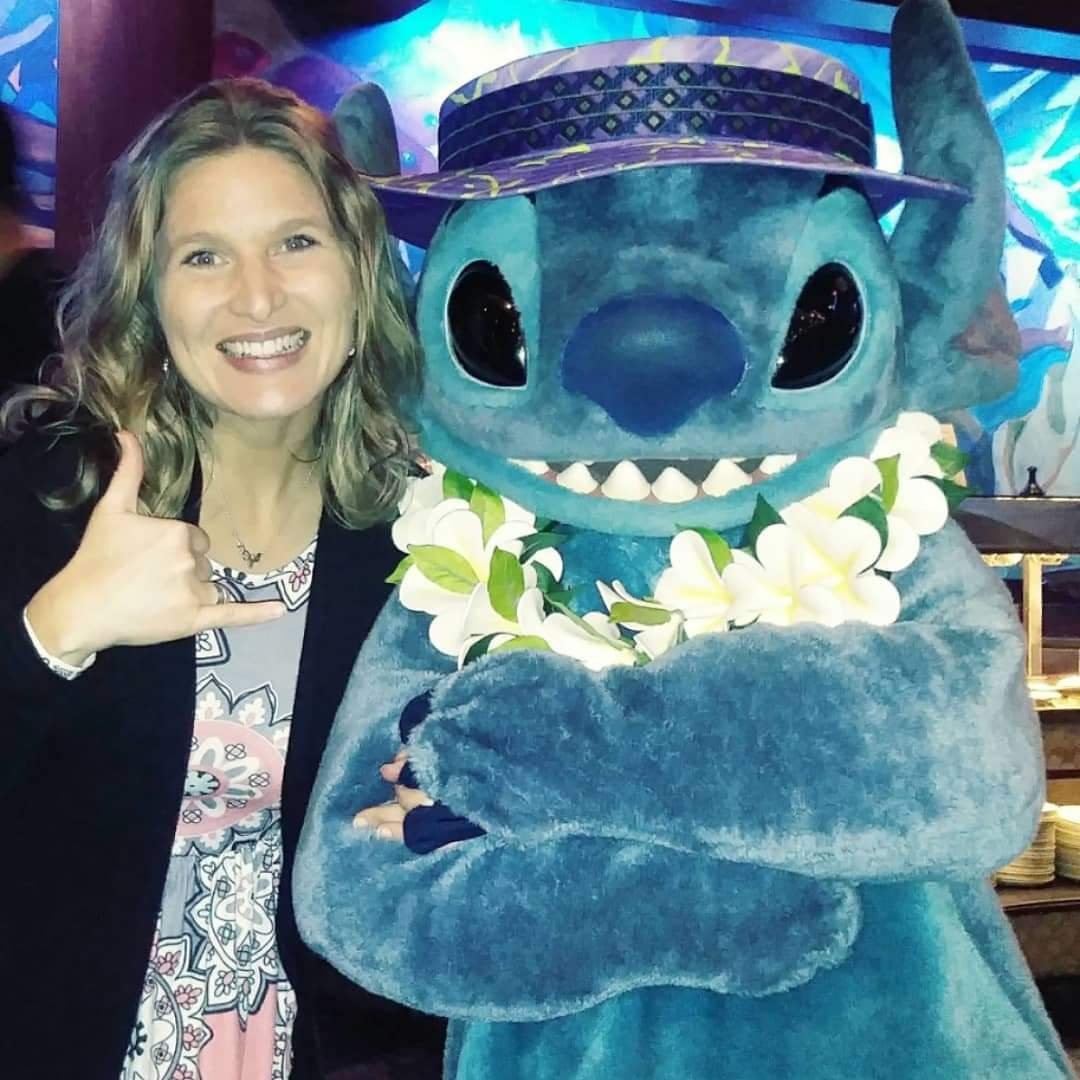 lorie disney travel agent with Stitch magical vacation services.